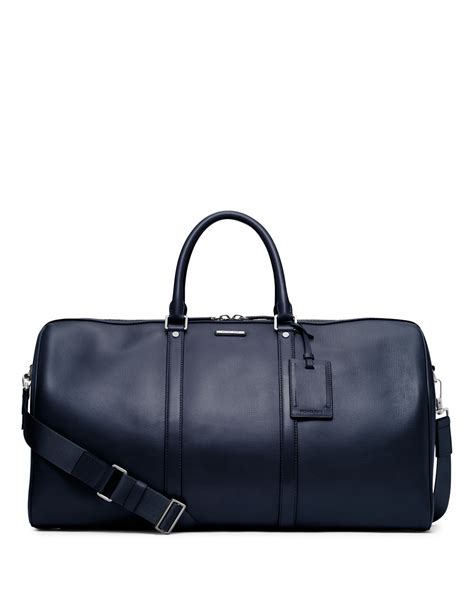 michael kors blue duffle bag|Michael Kors travel suitcase.